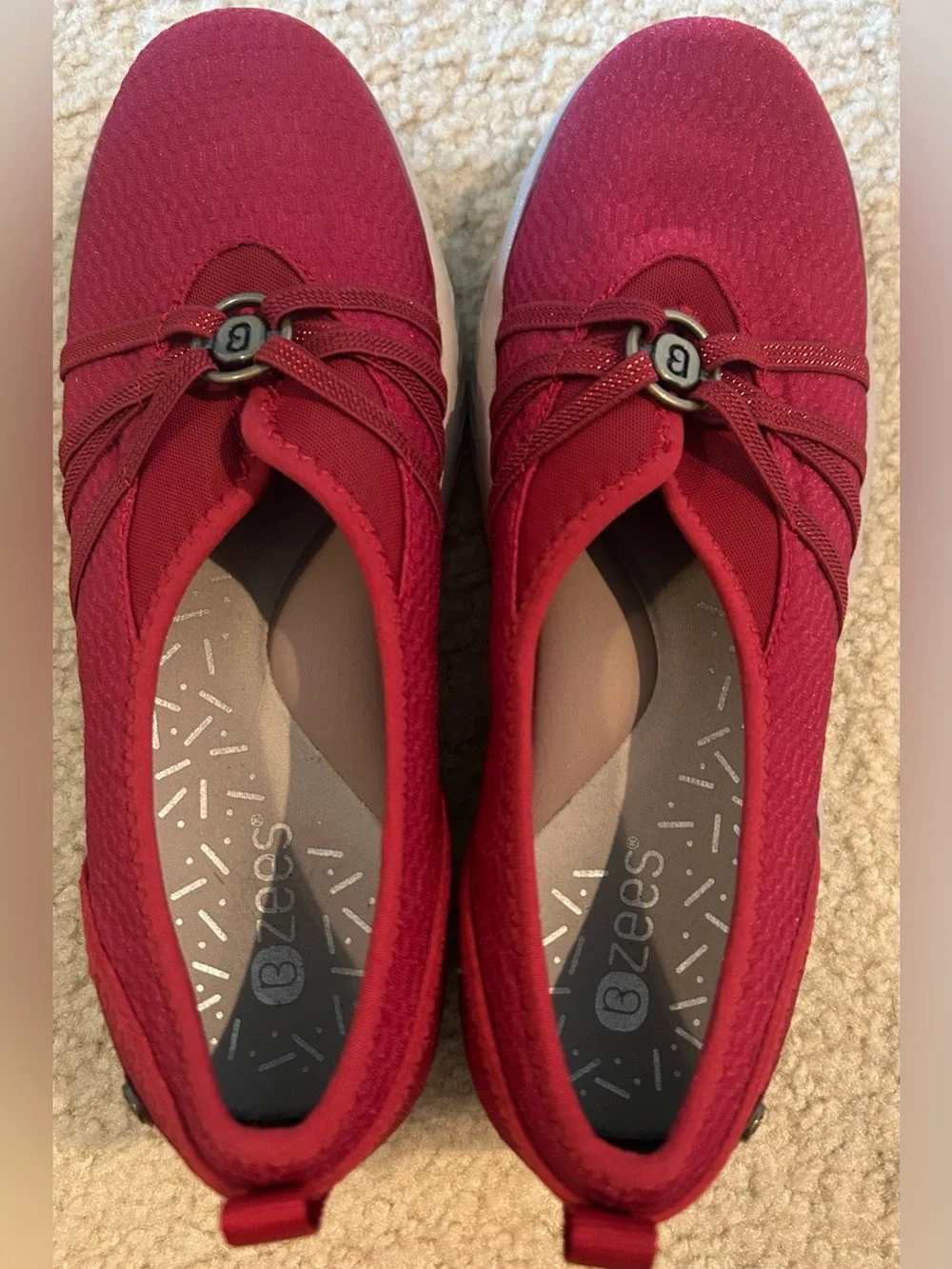 Bzees Women's Niche Slip-On Sneakers in Merlot Red with Gold Logo Accent 8.5